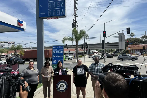 Photo from a press conference in front of a San Pedro gas station