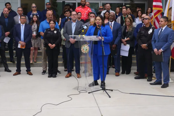 People at a press conference in Commerce, CA