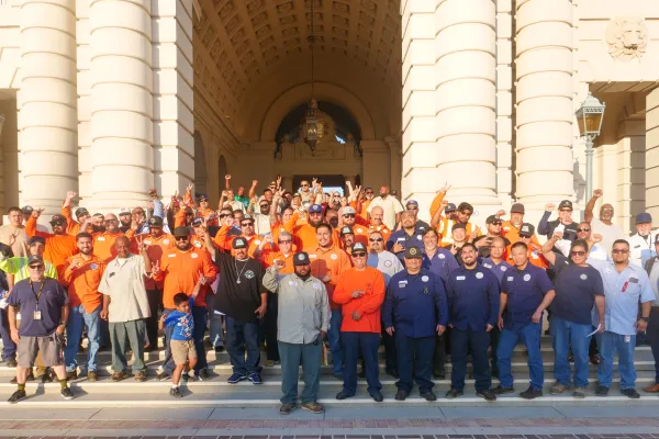 Members of AFSCME Local 858 standing outside of Pasadena City Hall