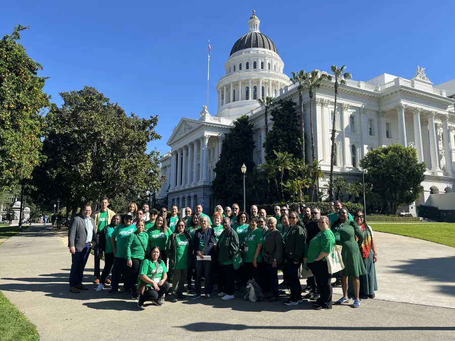 Members of AFSCME District Council 36 take a group photo in front of the California State Capitol
