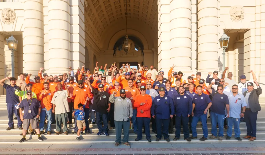 Members of AFSCME Local 858 standing outside of Pasadena City Hall