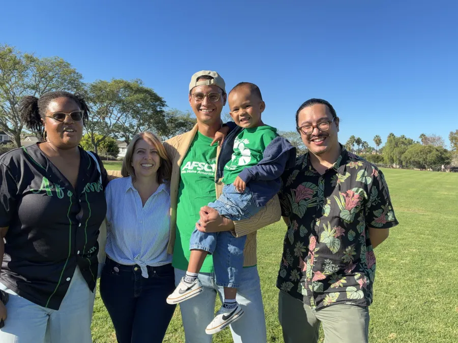 Photo of Marni von Wilpert with staff from AFSCME District Council 36